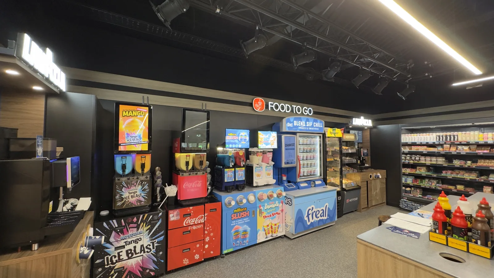 Frozen drinks stations beside a food-to-go counter