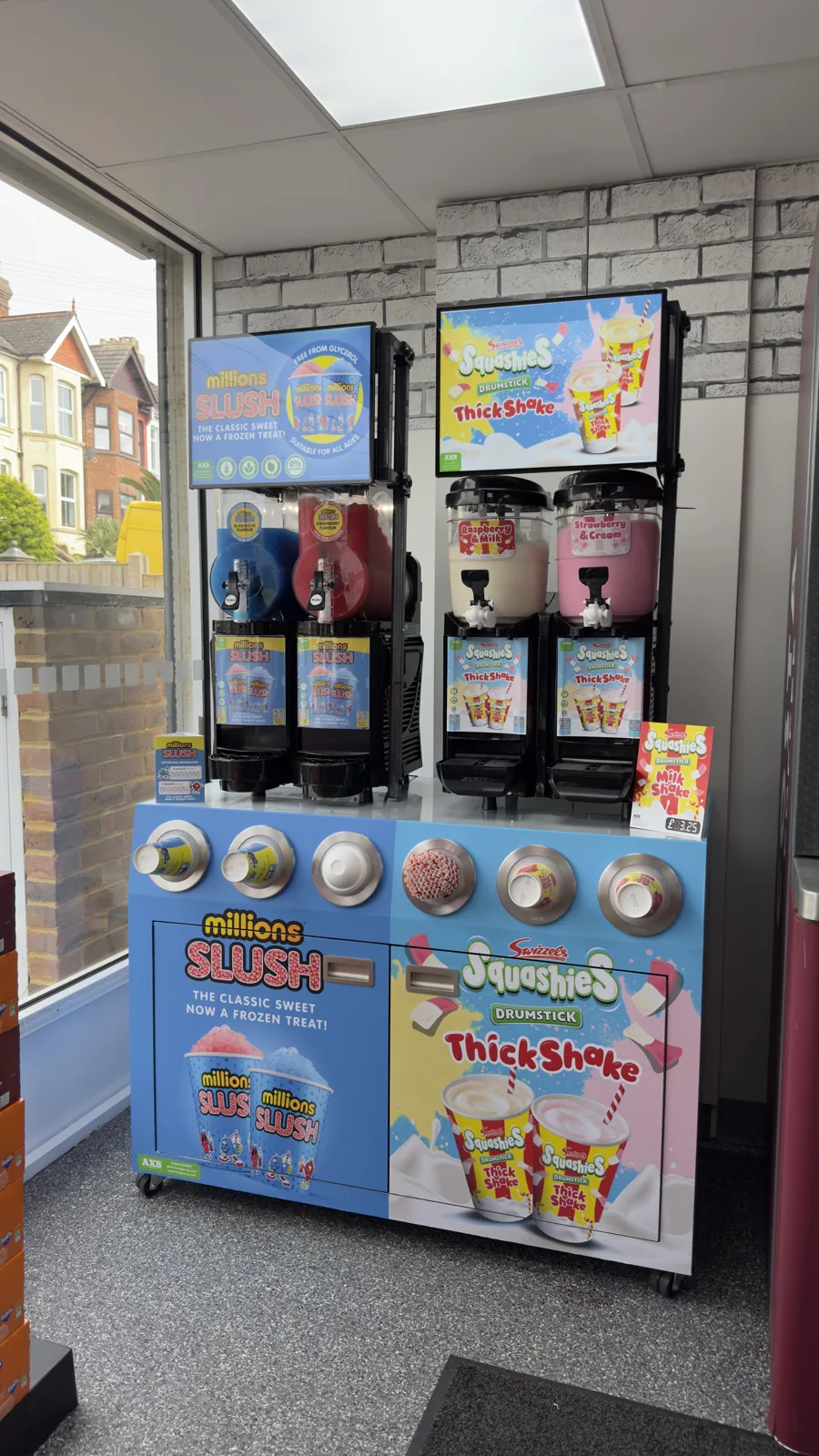 Millions Slush and Squashies station by a shop window